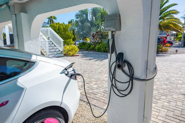 an aerial view of a house with a lake view