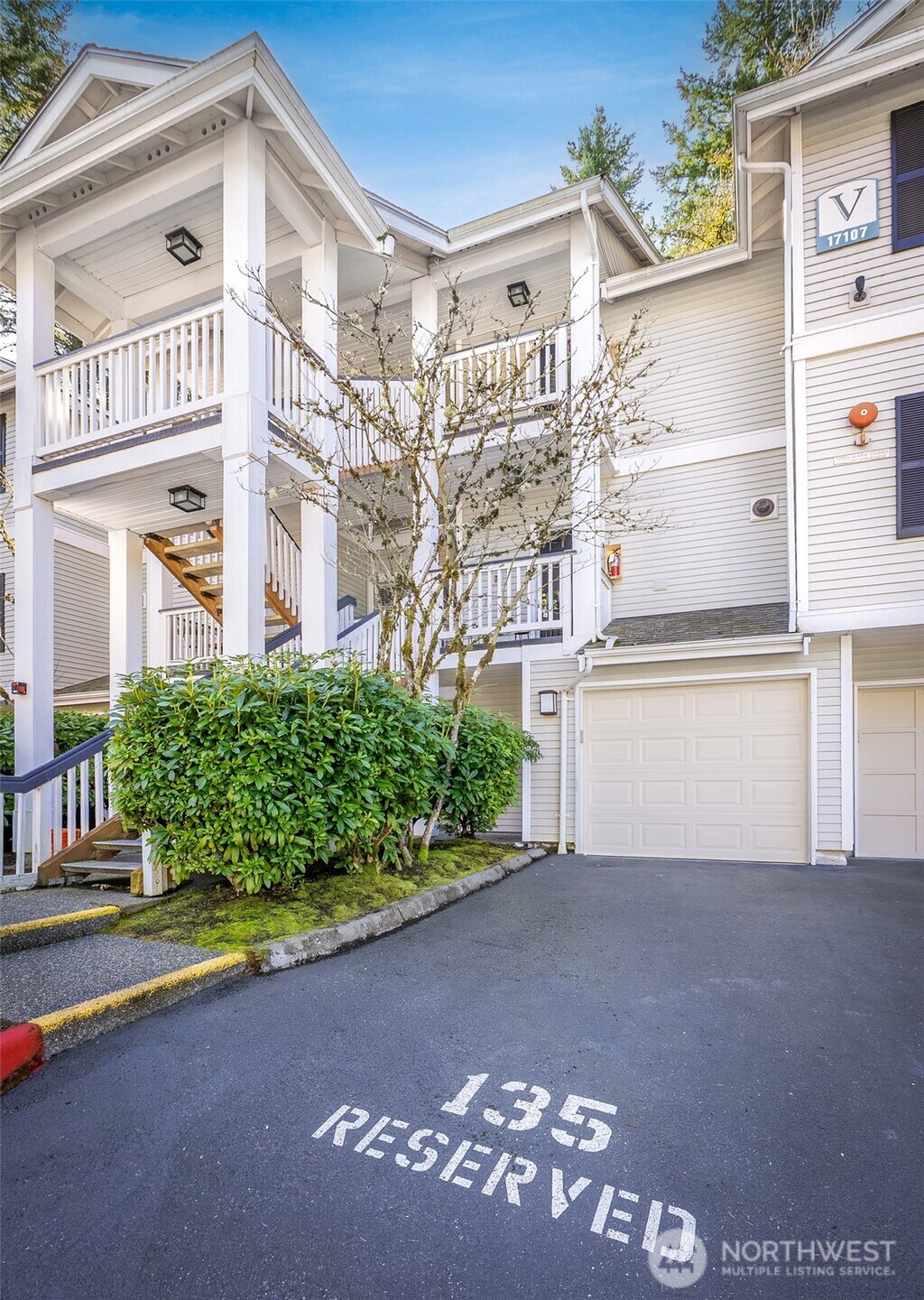 17107 123rd Place Northeast, Unit V302 Bothell, WA 98011 - Photo 15 of 20 a view of a street with a building in the background