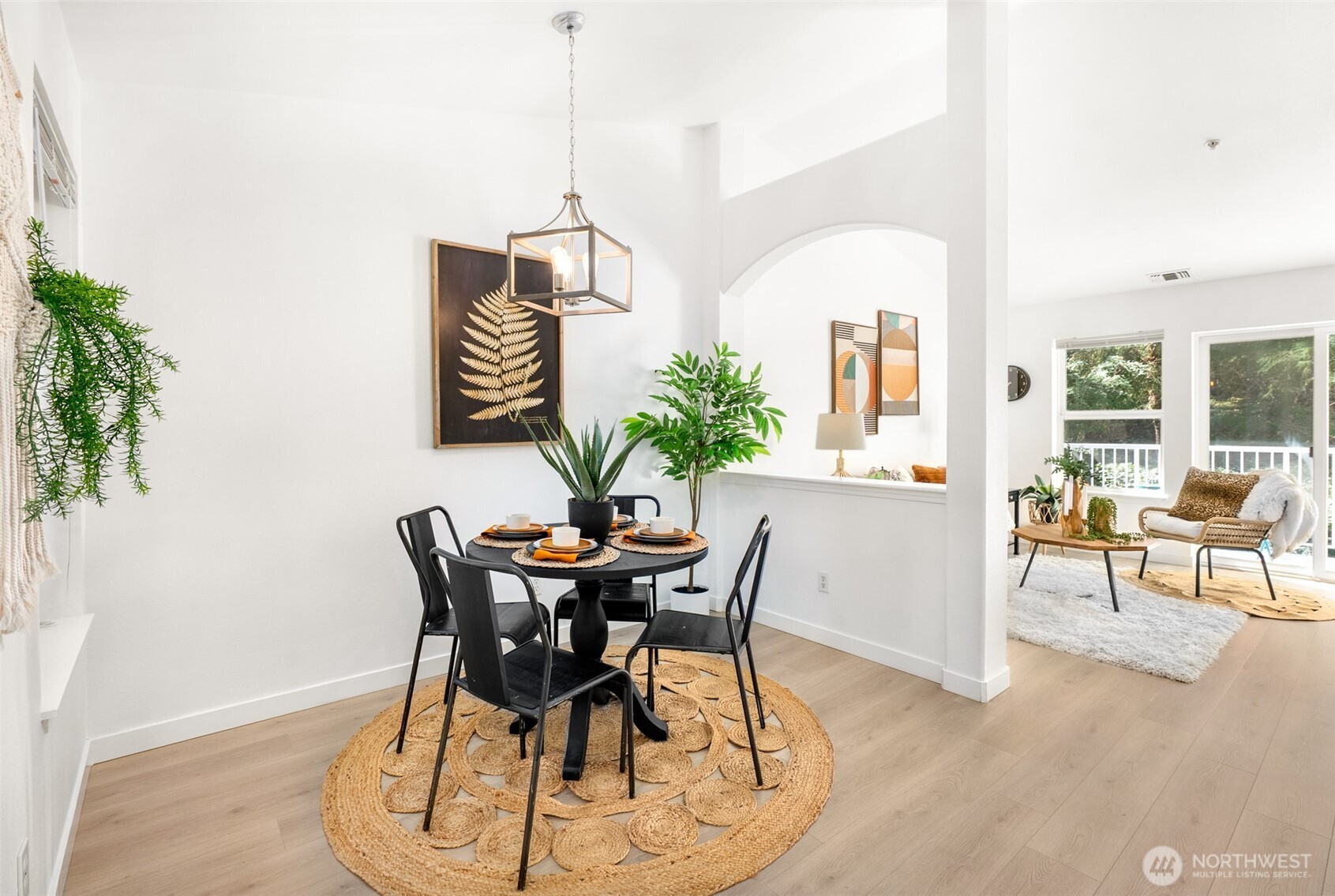 17107 123rd Place Northeast, Unit V302 Bothell, WA 98011 - Photo 2 of 20 a view of a dining room with furniture window and wooden floor