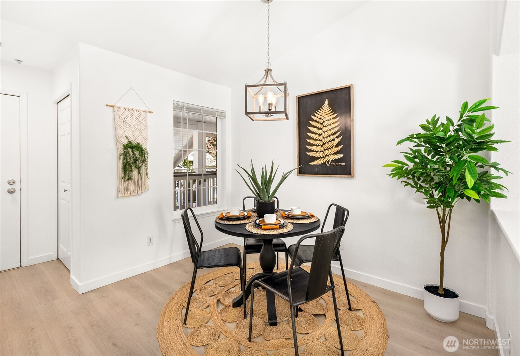 17107 123rd Place Northeast, Unit V302 Bothell, WA 98011 - Photo 3 of 20 a dining room with furniture and wooden floor