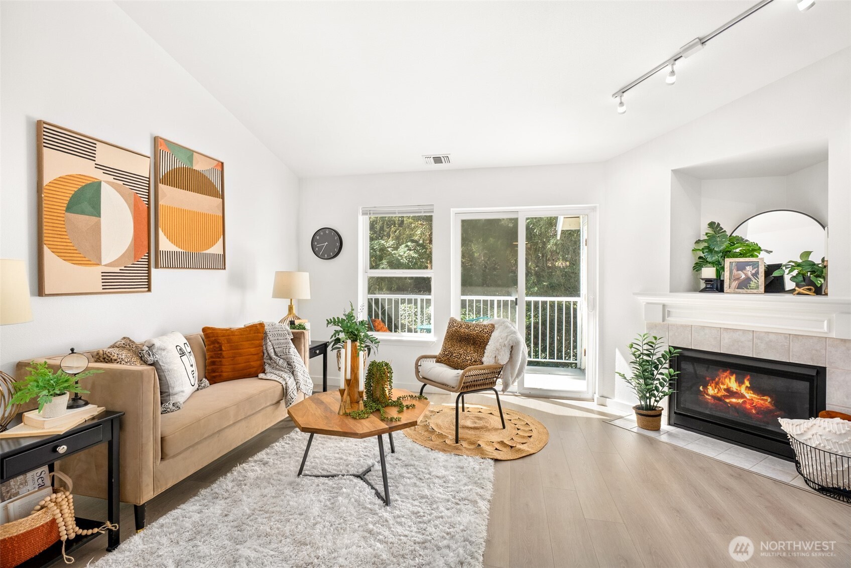17107 123rd Place Northeast, Unit V302 Bothell, WA 98011 - Photo 4 of 20 a living room with furniture fireplace and window