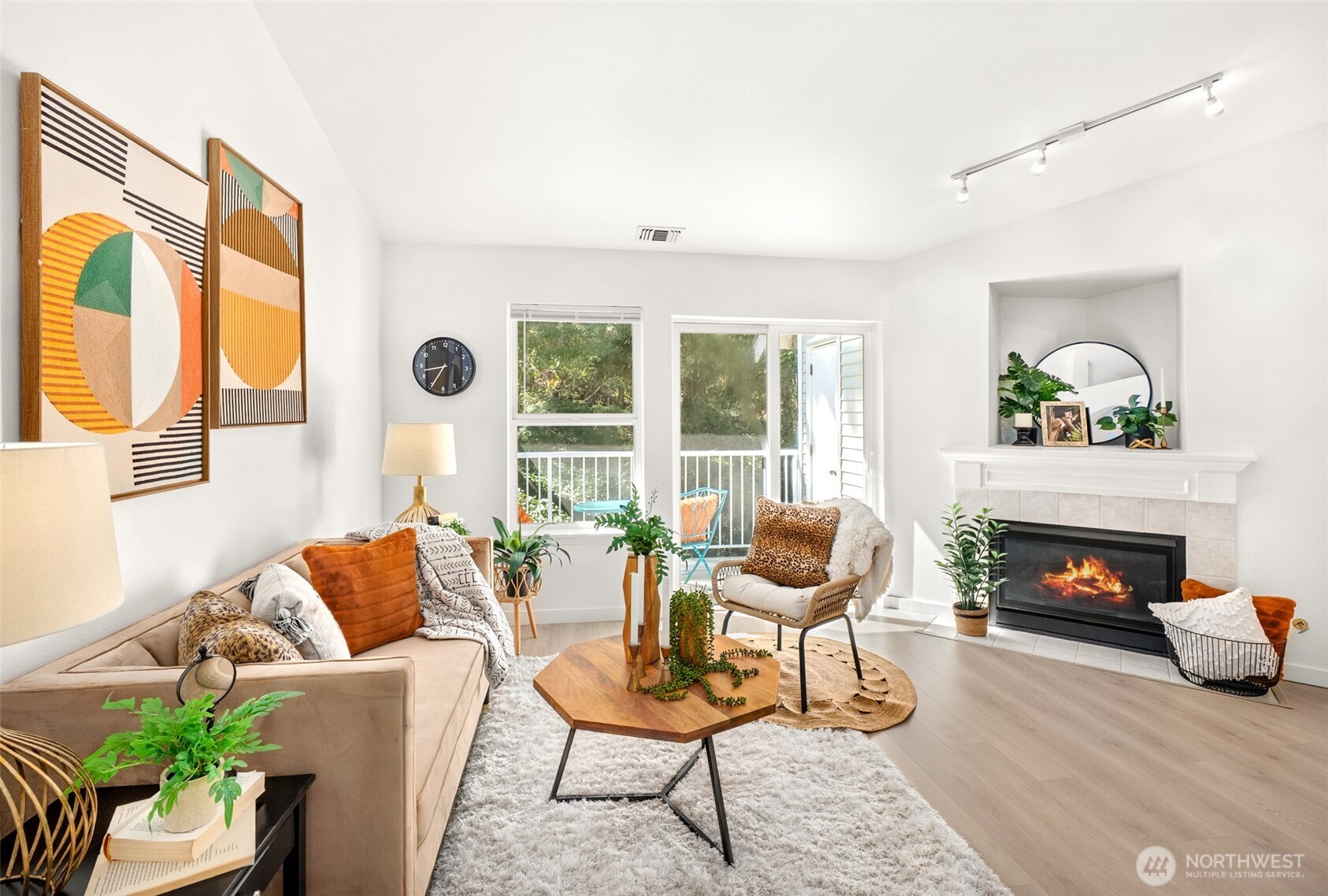 17107 123rd Place Northeast, Unit V302 Bothell, WA 98011 - Photo 5 of 20 a living room with furniture and a fireplace