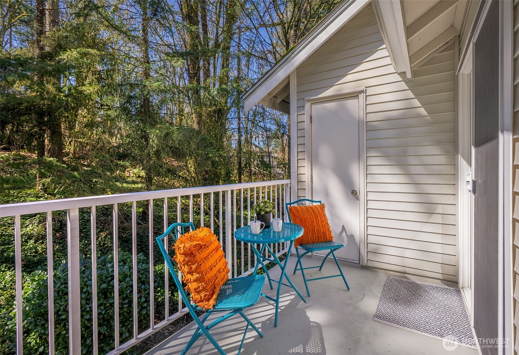 17107 123rd Place Northeast, Unit V302 Bothell, WA 98011 - Photo 6 of 20 a view of a balcony with chairs