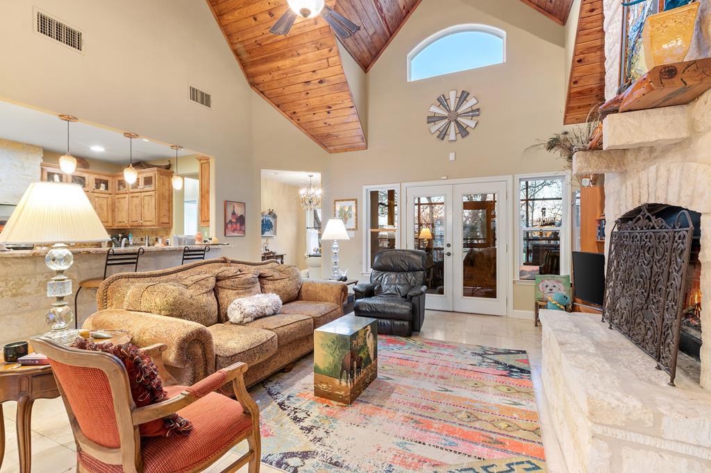 2142 Lightstone Fredericksburg, TX 78624 - Photo 2 of 30 a living room with furniture and wooden floor