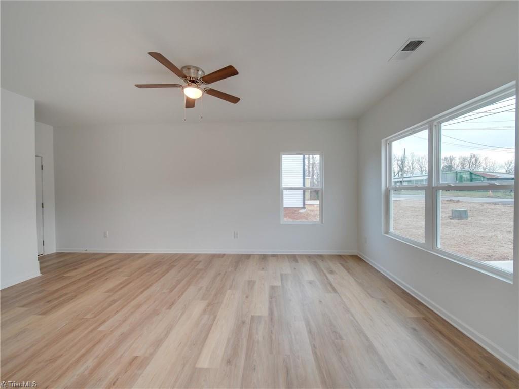 5814 Old Rural Hall Road Winston-Salem, NC 27105 - Photo 5 of 21 Unstaged Living Room | Some Features may vary