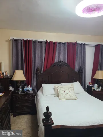 a living room with a couch and a fireplace