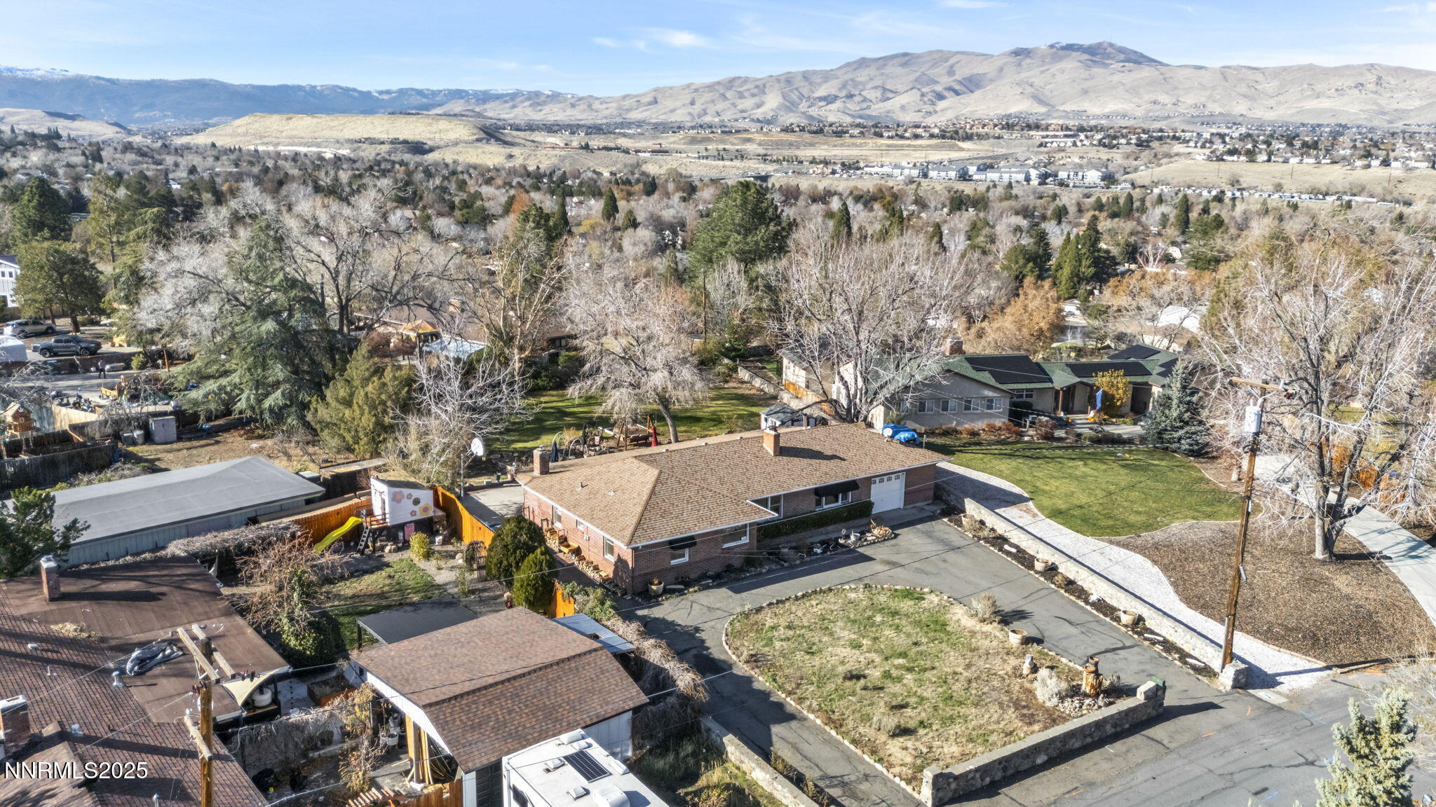 72 Suda Way Reno, NV 89509 - Photo 2 of 41 an aerial view of a house with a mountain