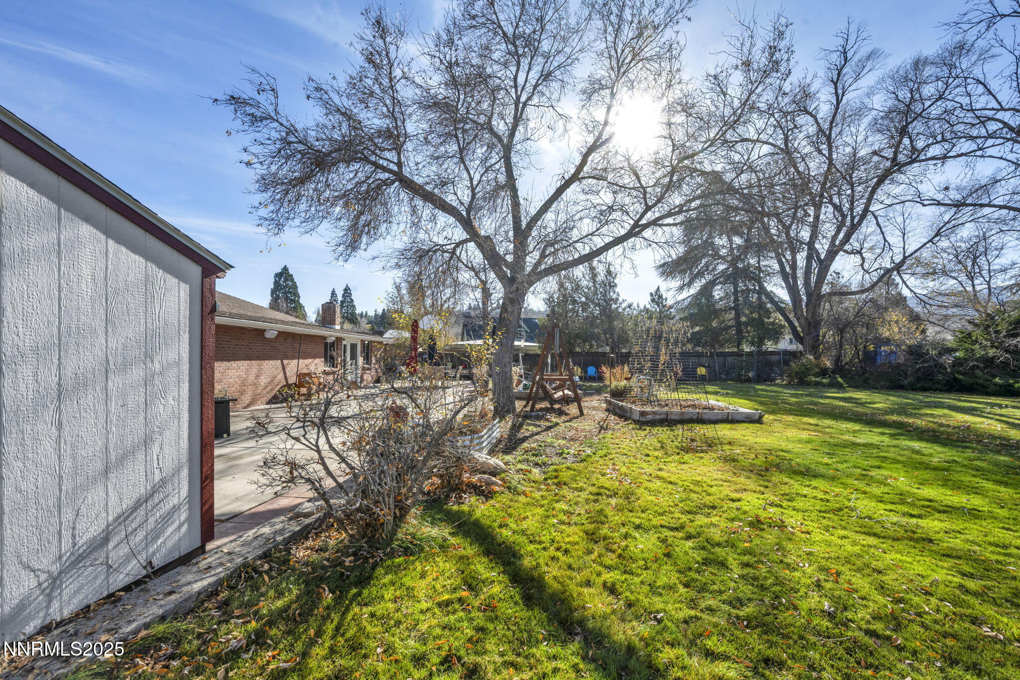 72 Suda Way Reno, NV 89509 - Photo 31 of 41 a view of a yard with swimming pool