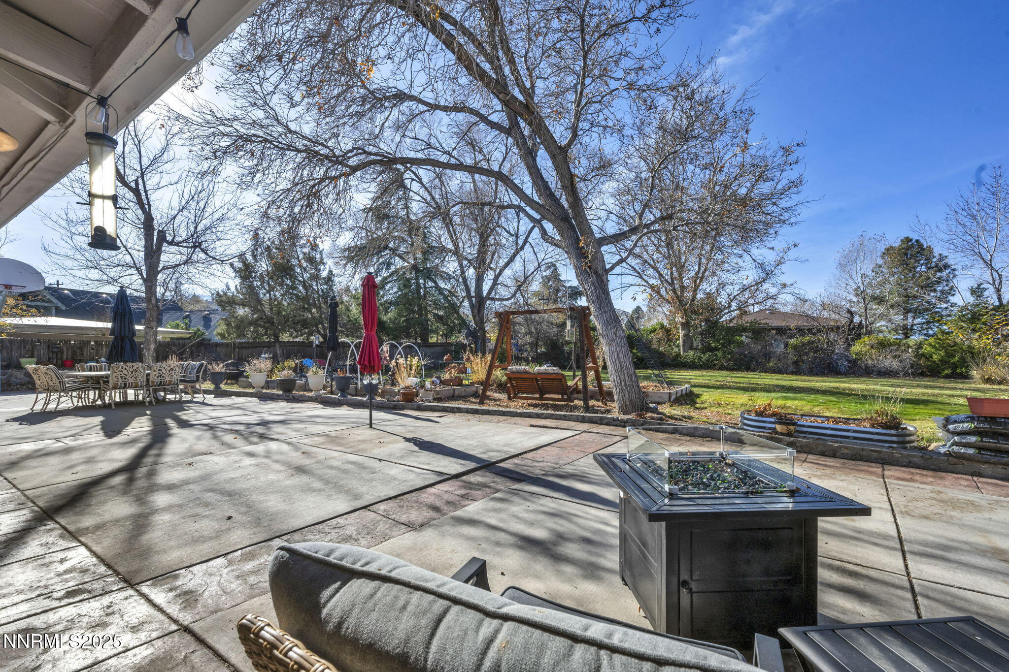 72 Suda Way Reno, NV 89509 - Photo 33 of 41 a view of a swimming pool with a patio and a yard