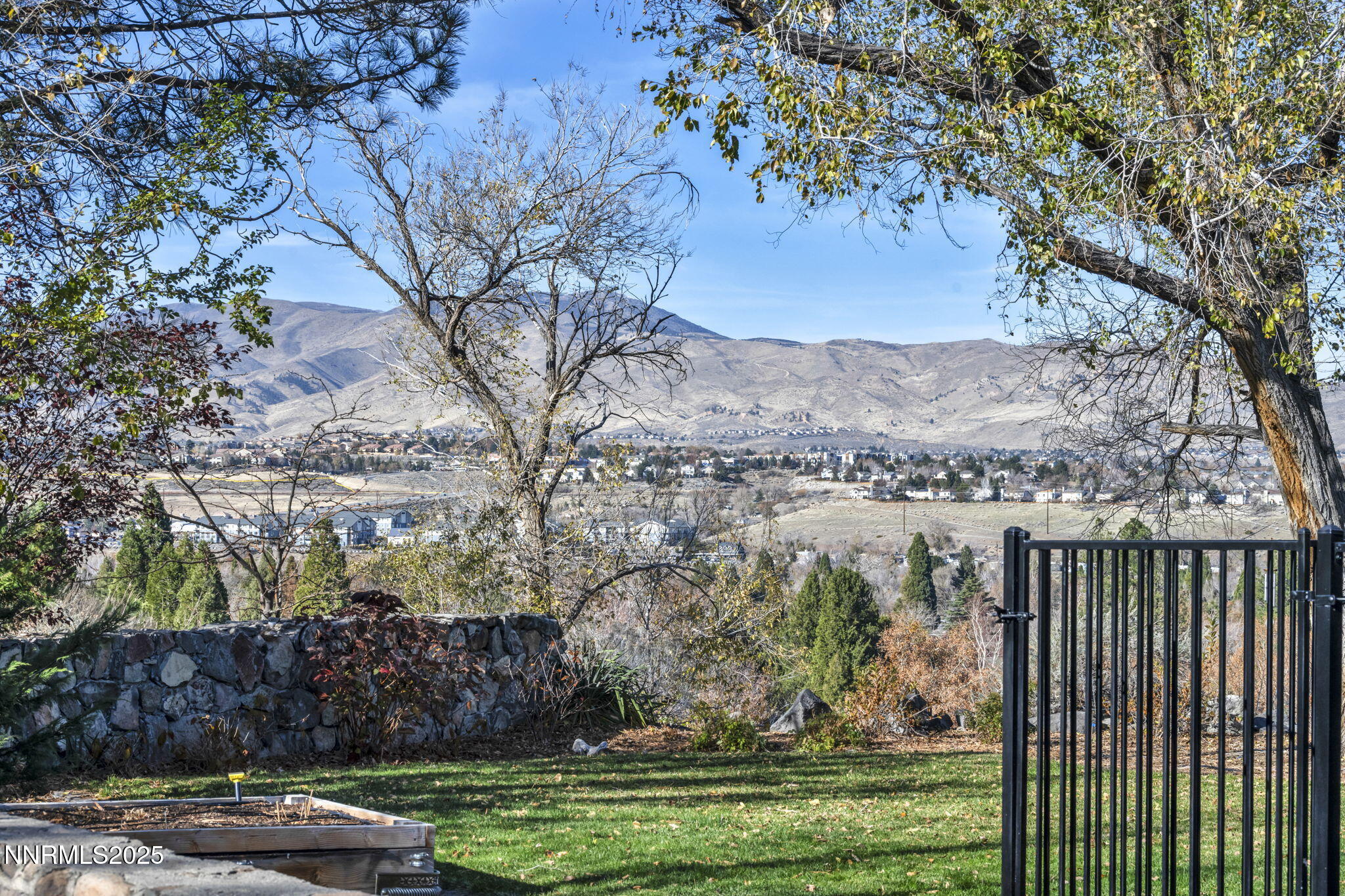 72 Suda Way Reno, NV 89509 - Photo 37 of 41 a view of a yard with wooden fence