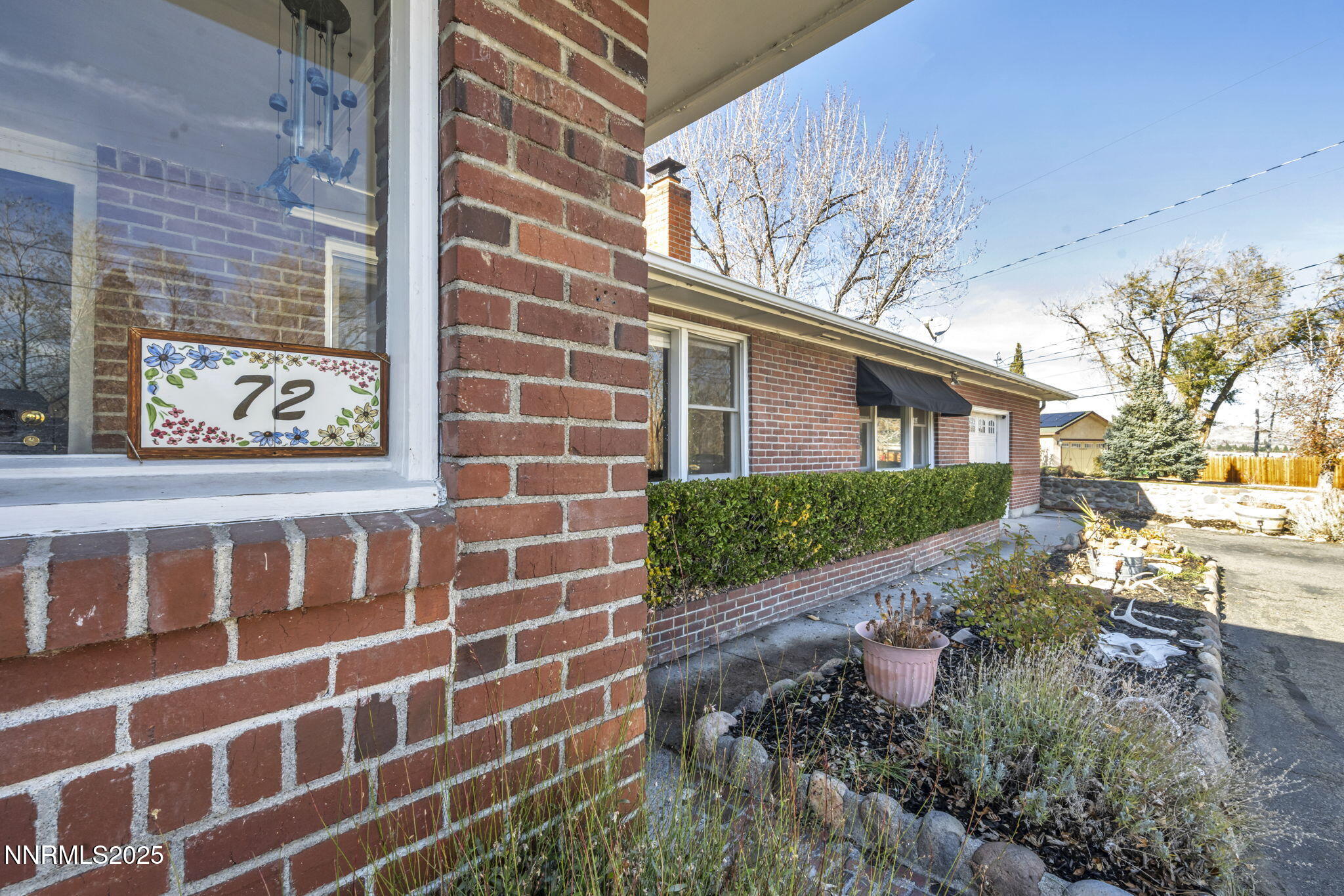 72 Suda Way Reno, NV 89509 - Photo 6 of 41 a view of a brick buildings with yard