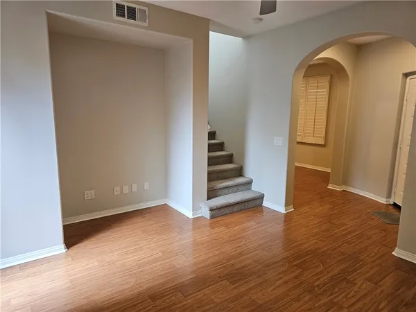 a view of entryway with wooden floor