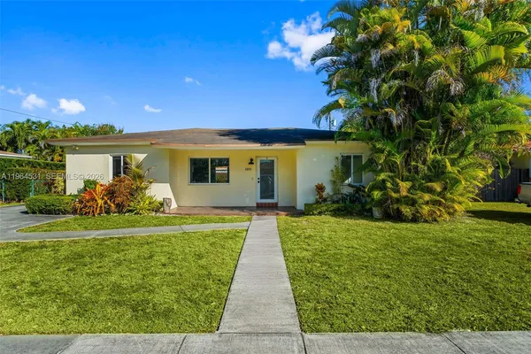 a view of a house with garden