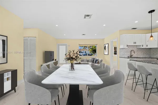 a view of a dining room with furniture