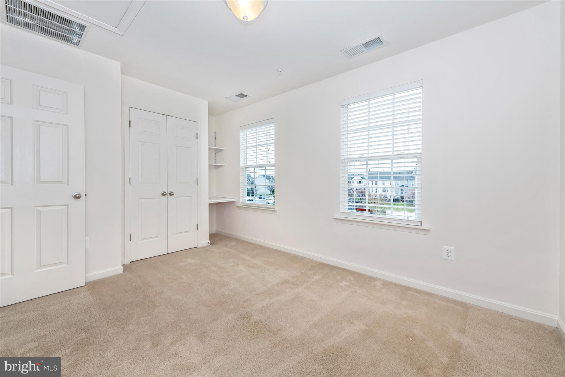 645 Tivoli Road Frederick, MD 21703 - Photo 11 of 21 an empty room with windows
