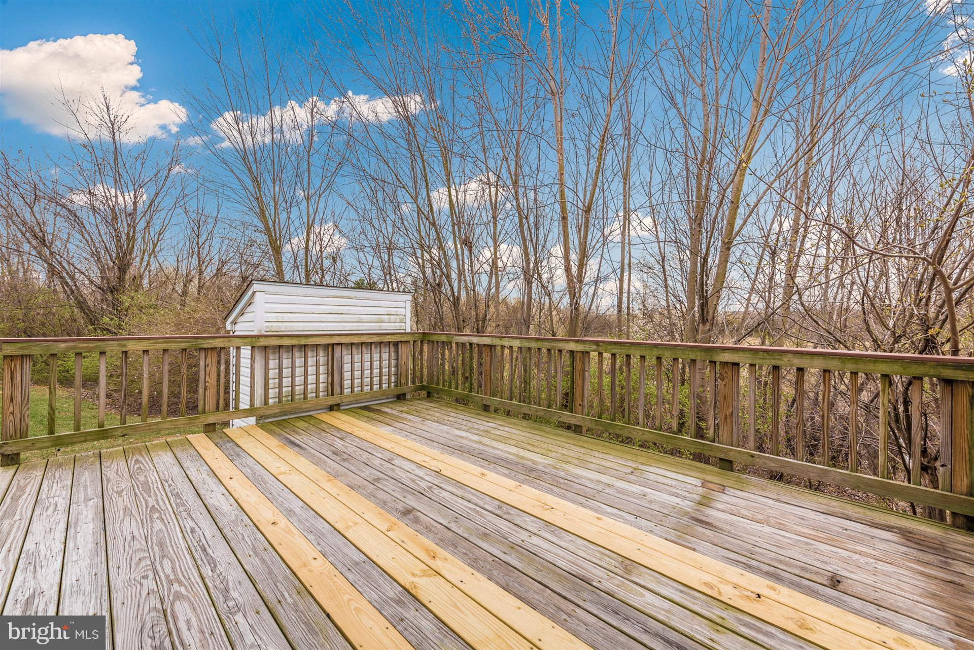 645 Tivoli Road Frederick, MD 21703 - Photo 17 of 21 a view of deck with wooden floor and fence