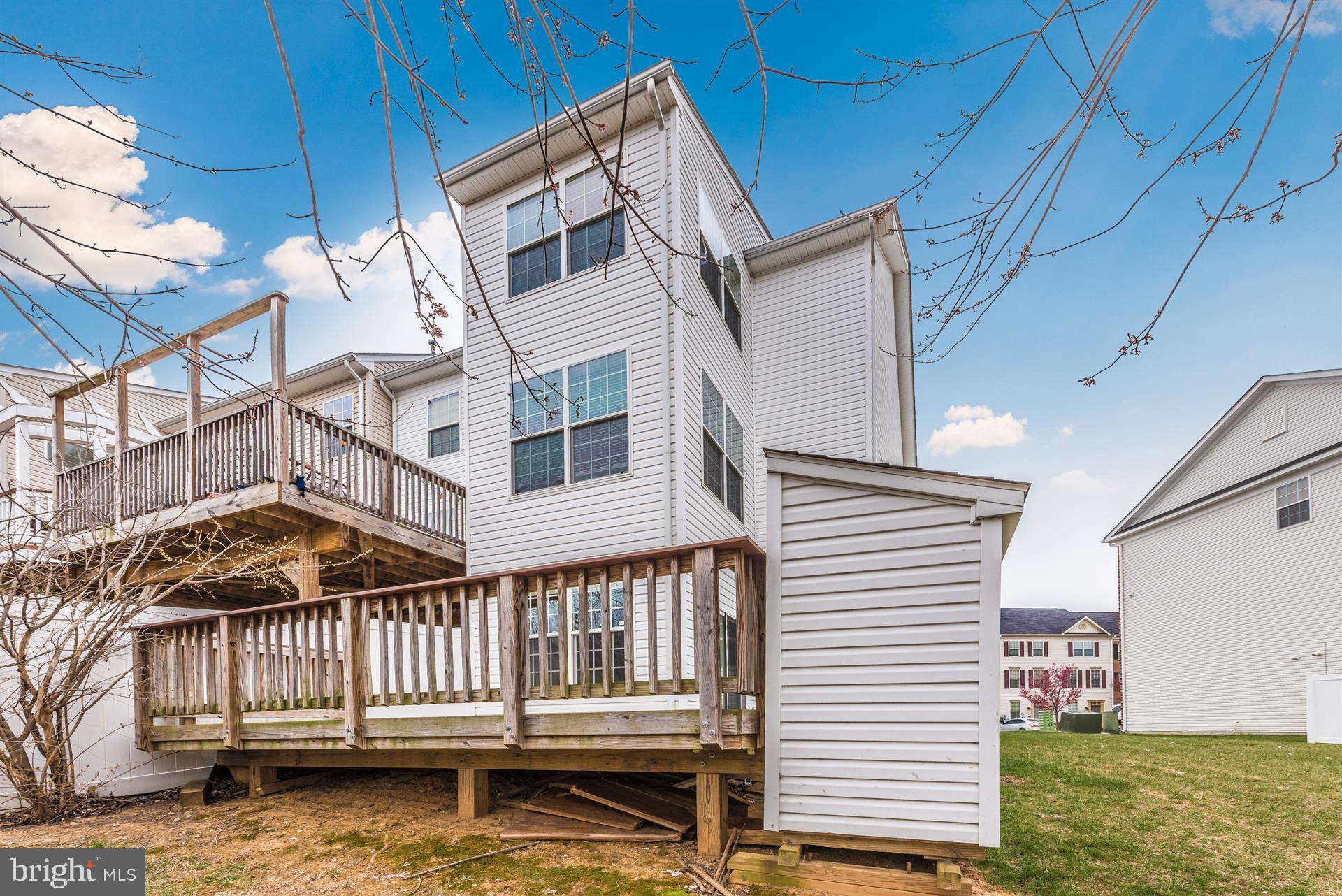 645 Tivoli Road Frederick, MD 21703 - Photo 21 of 21 a view of a house with wooden deck