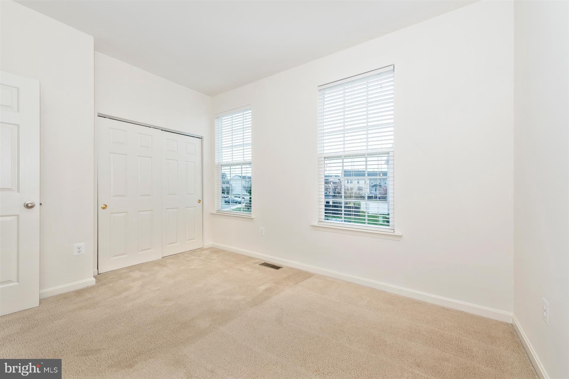 645 Tivoli Road Frederick, MD 21703 - Photo 9 of 21 an empty room with windows