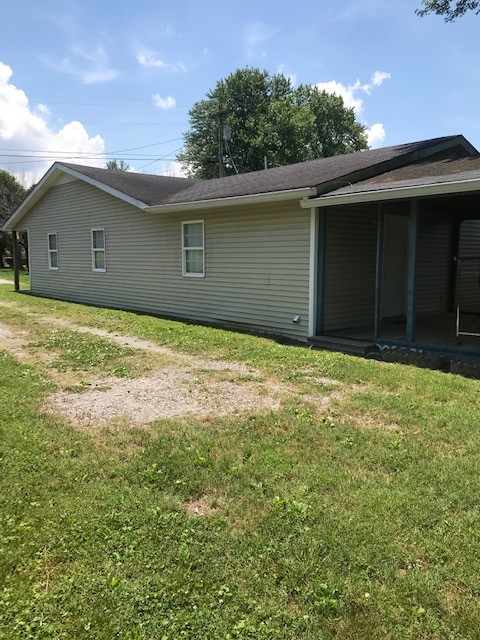 3905 Red Boiling Springs Road Lafayette, TN 37083 - Photo 1 of 2 a house with a yard