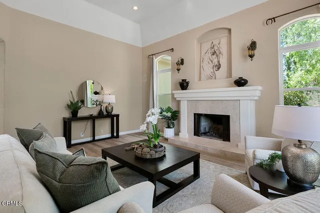 a view of a dining room with furniture wooden floor and chandelier