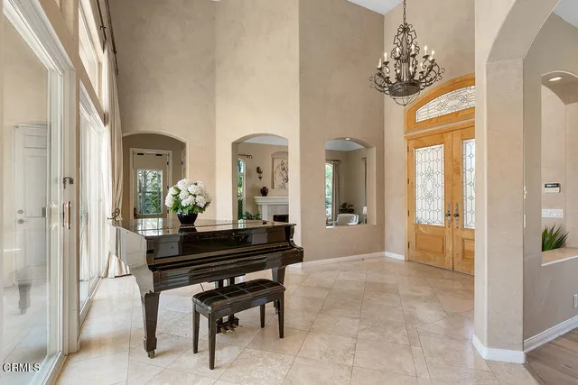 a living room with furniture and a table