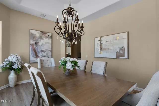 a kitchen with granite countertop a cabinets and steel appliances