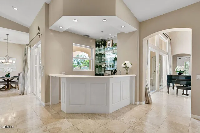 a view of a dining room with furniture window and outside view