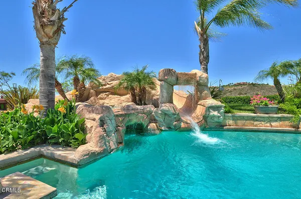 a view of a house with patio outdoor seating