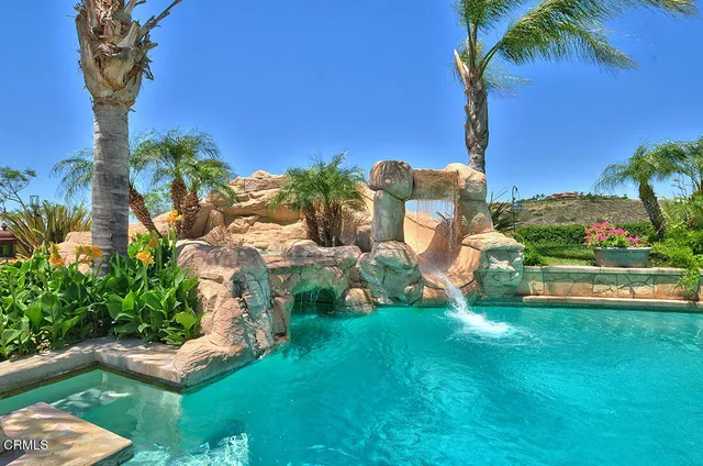 a view of a house with patio outdoor seating