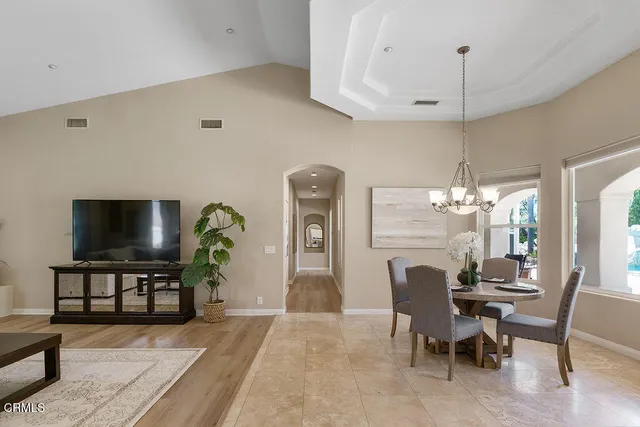 a large spacious bathroom with a large tub and shower