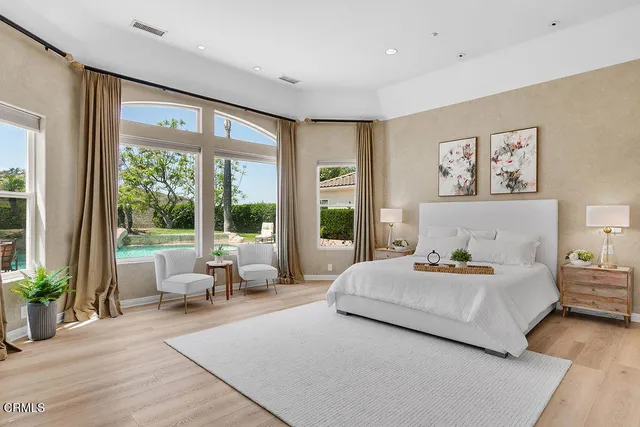 a bathroom with a sink vanity and a mirror