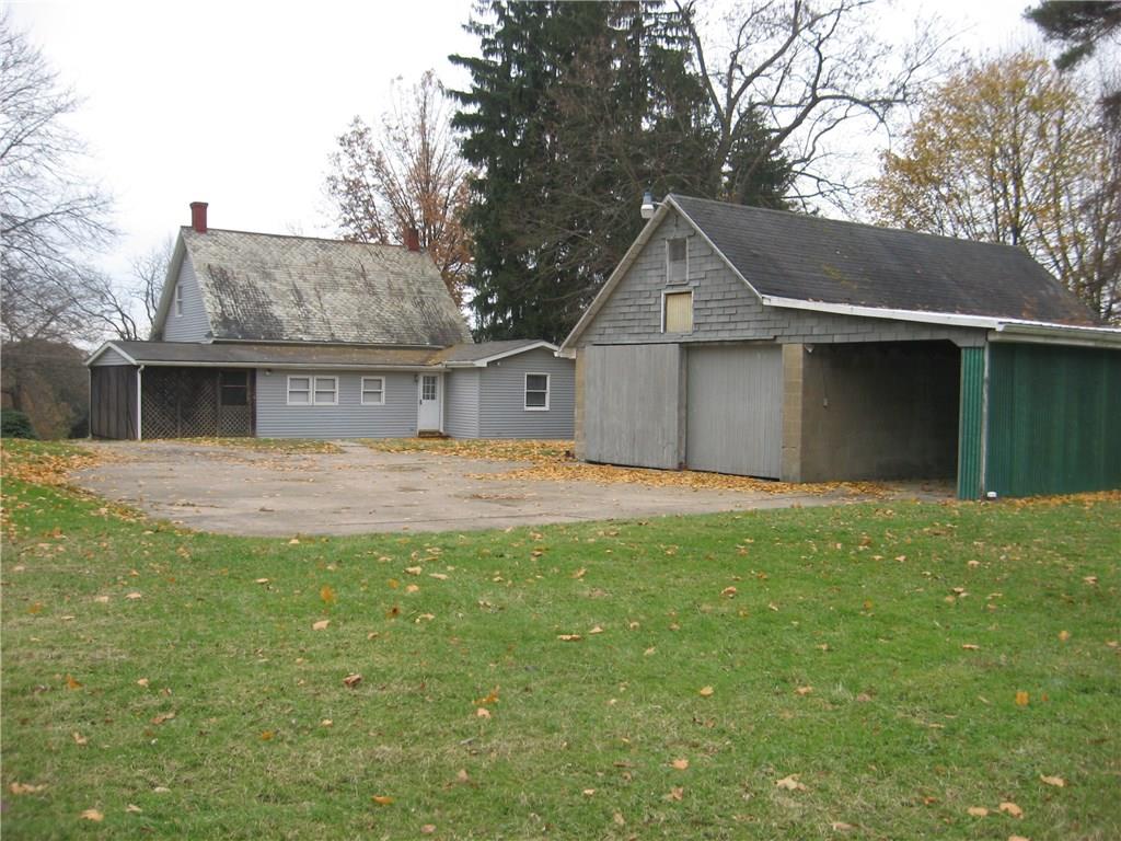 Welcome to 135 Freeport Rd.  This home sits on almost 1 acre lot that backs up to wooded area.