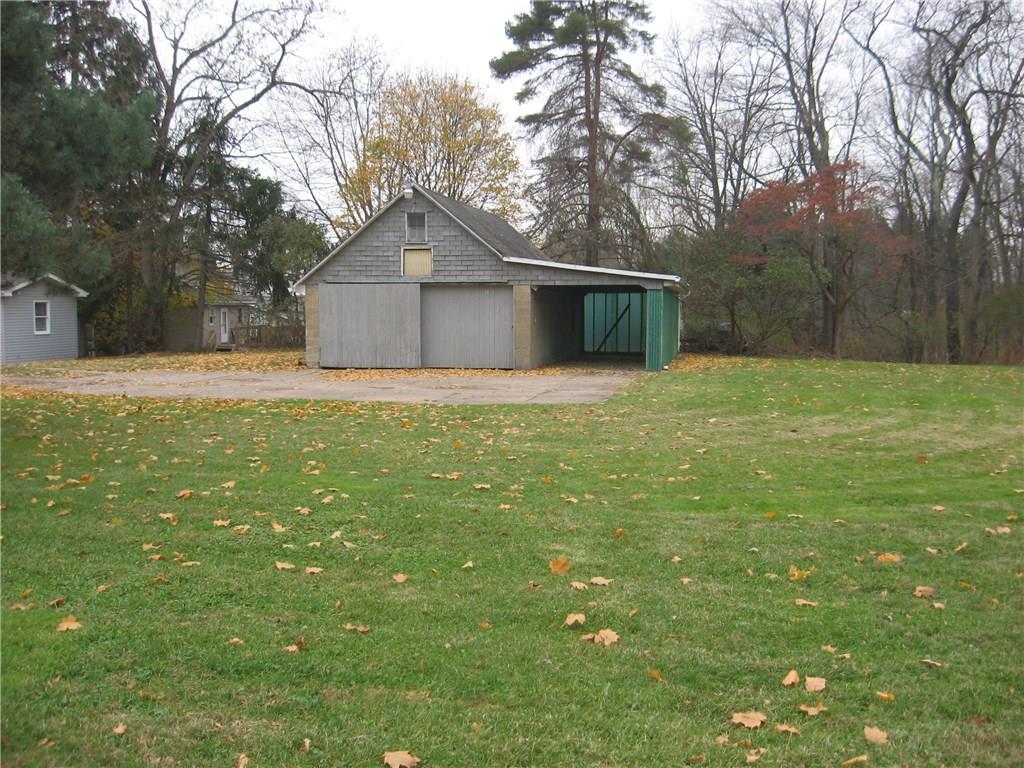 135 Freeport Road Butler, PA 16002 - Photo 9 of 18 2 stall garage with added carport and plenty of extra space to park additional cars.