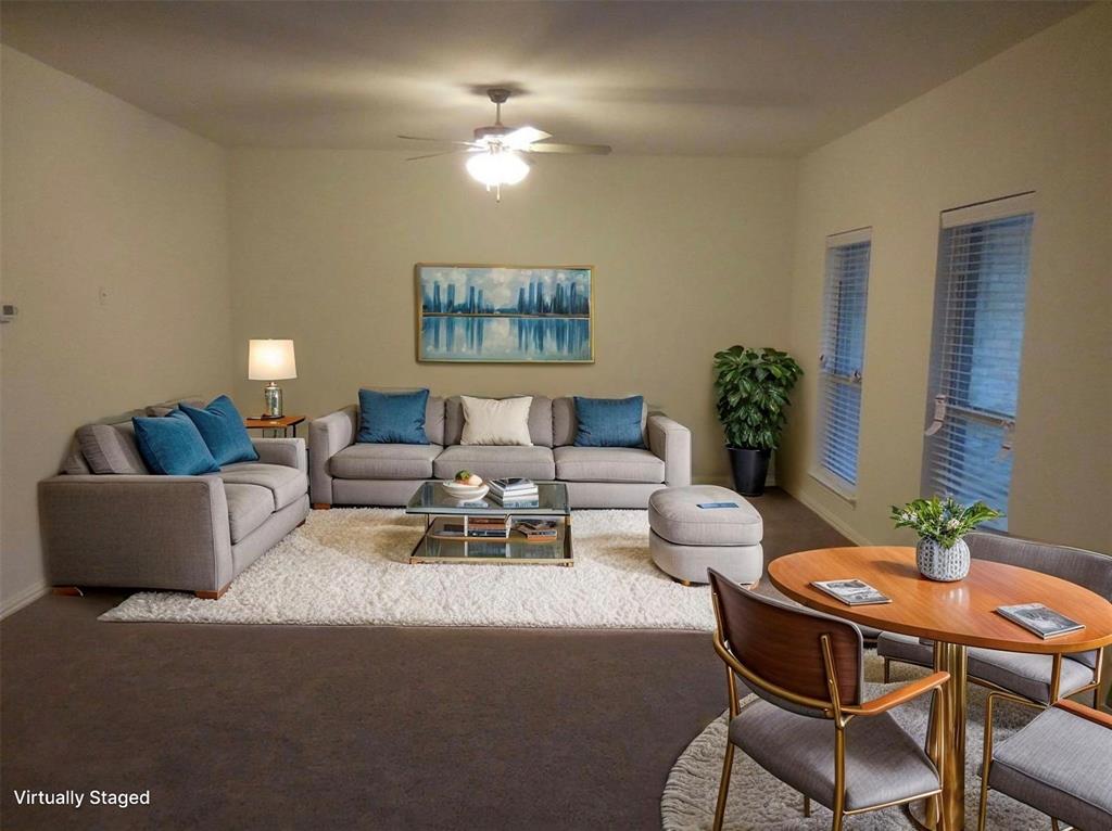 2224 Abbey Lane Mesquite, TX 75181 - Photo 2 of 9 **VIRTUALLY STAGED**Living area featuring carpet floors and a ceiling fan