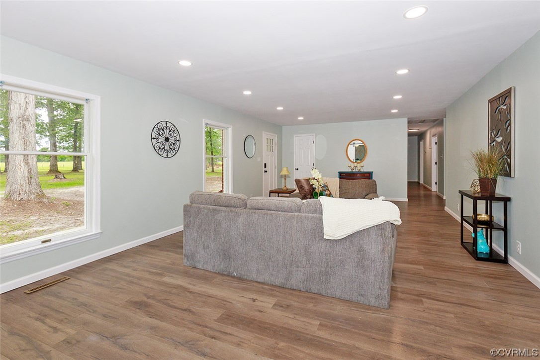 674 Spring Grove Road Spring Grove, VA 23881 - Photo 11 of 37 a living room with furniture wooden floor and window