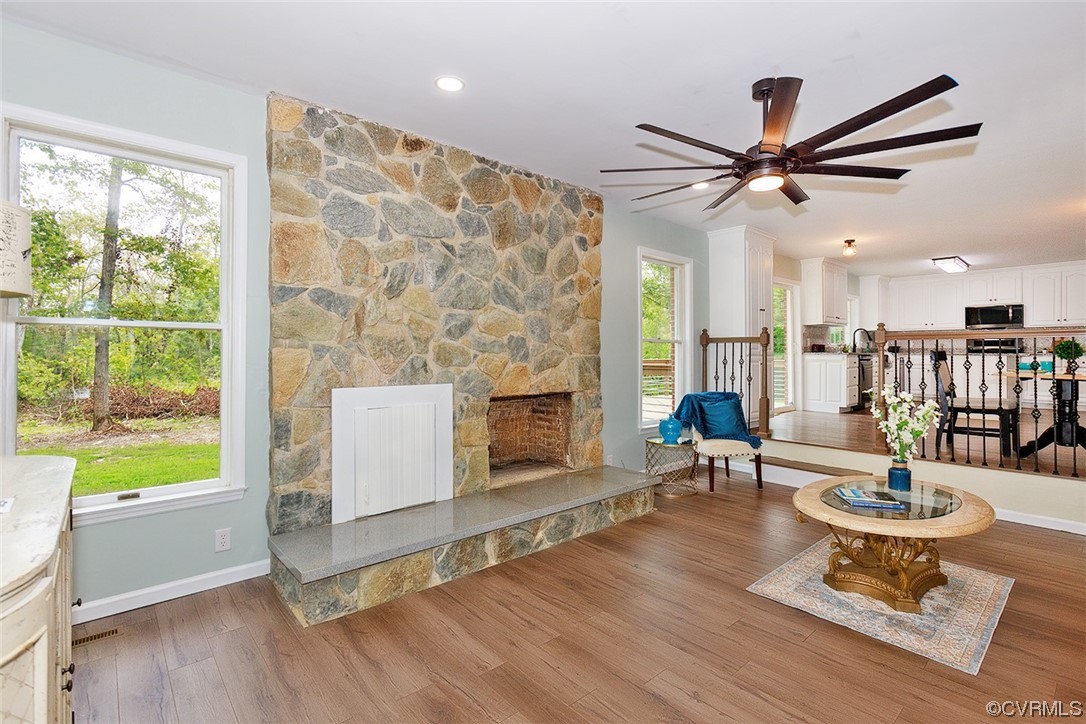 674 Spring Grove Road Spring Grove, VA 23881 - Photo 14 of 37 a living room with fireplace furniture and a large window