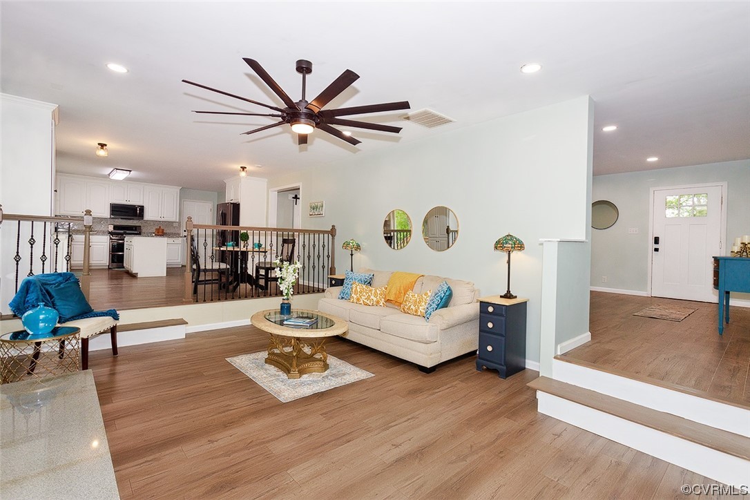 674 Spring Grove Road Spring Grove, VA 23881 - Photo 15 of 37 a living room with furniture and kitchen view