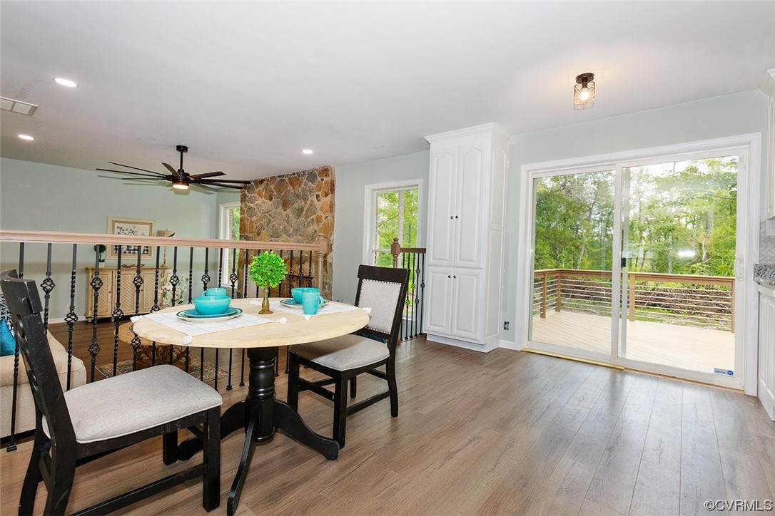 674 Spring Grove Road Spring Grove, VA 23881 - Photo 17 of 37 a view of a dining room with furniture window and wooden floor