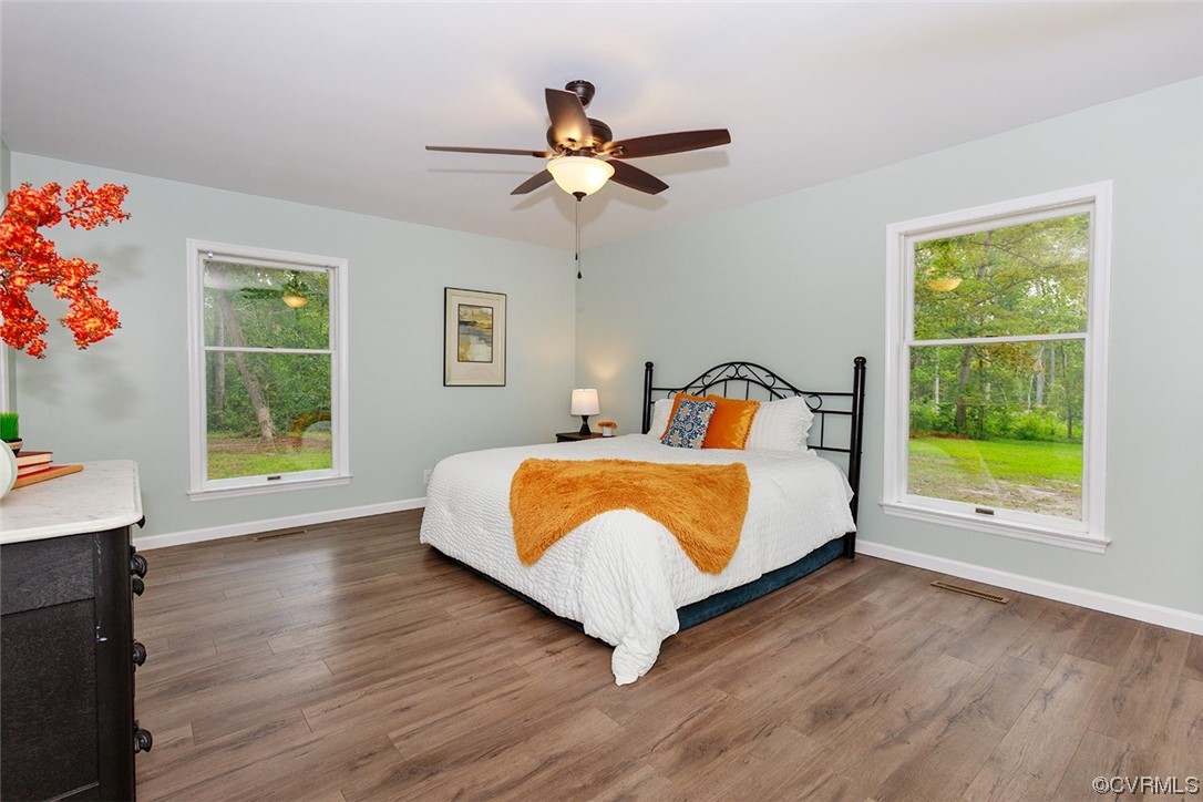 674 Spring Grove Road Spring Grove, VA 23881 - Photo 23 of 37 a bedroom with a bed and window