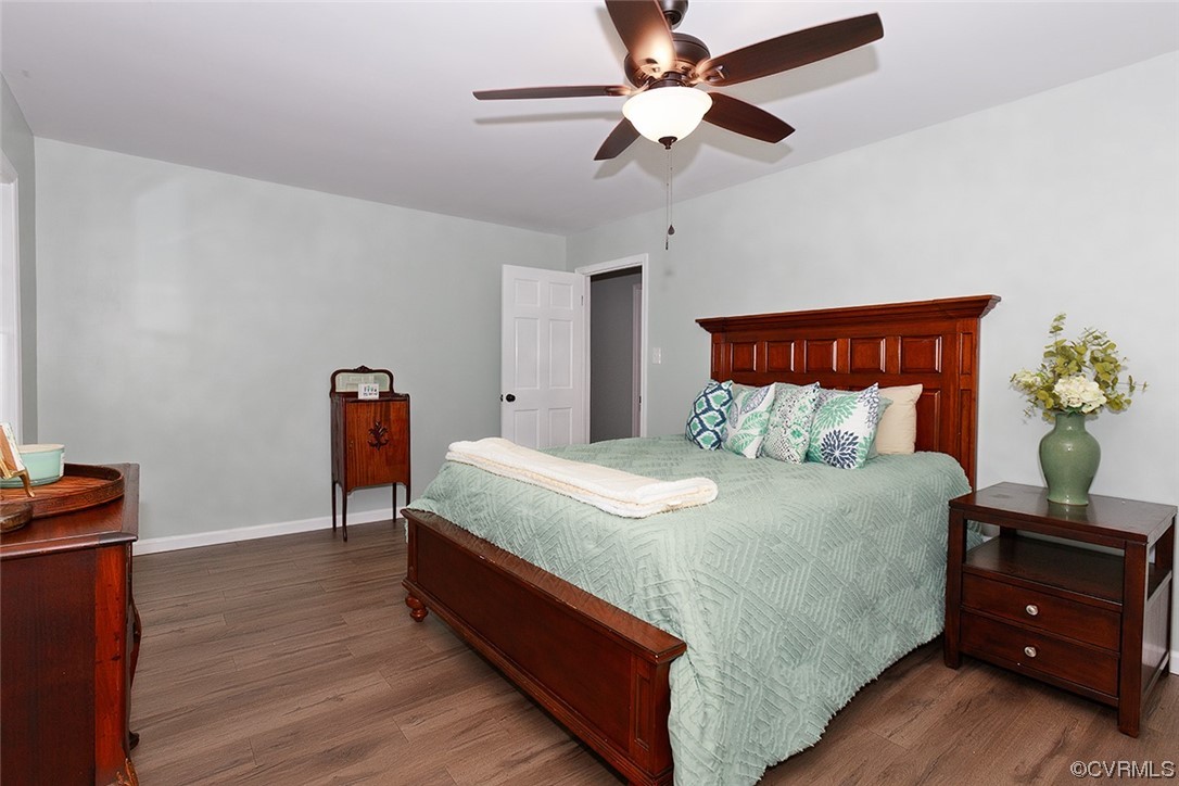 674 Spring Grove Road Spring Grove, VA 23881 - Photo 28 of 37 a bed sitting in a bedroom and furniture