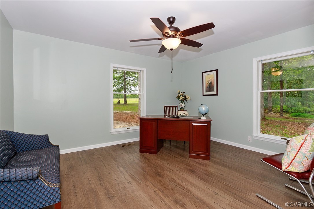 674 Spring Grove Road Spring Grove, VA 23881 - Photo 29 of 37 a living room with furniture and a window