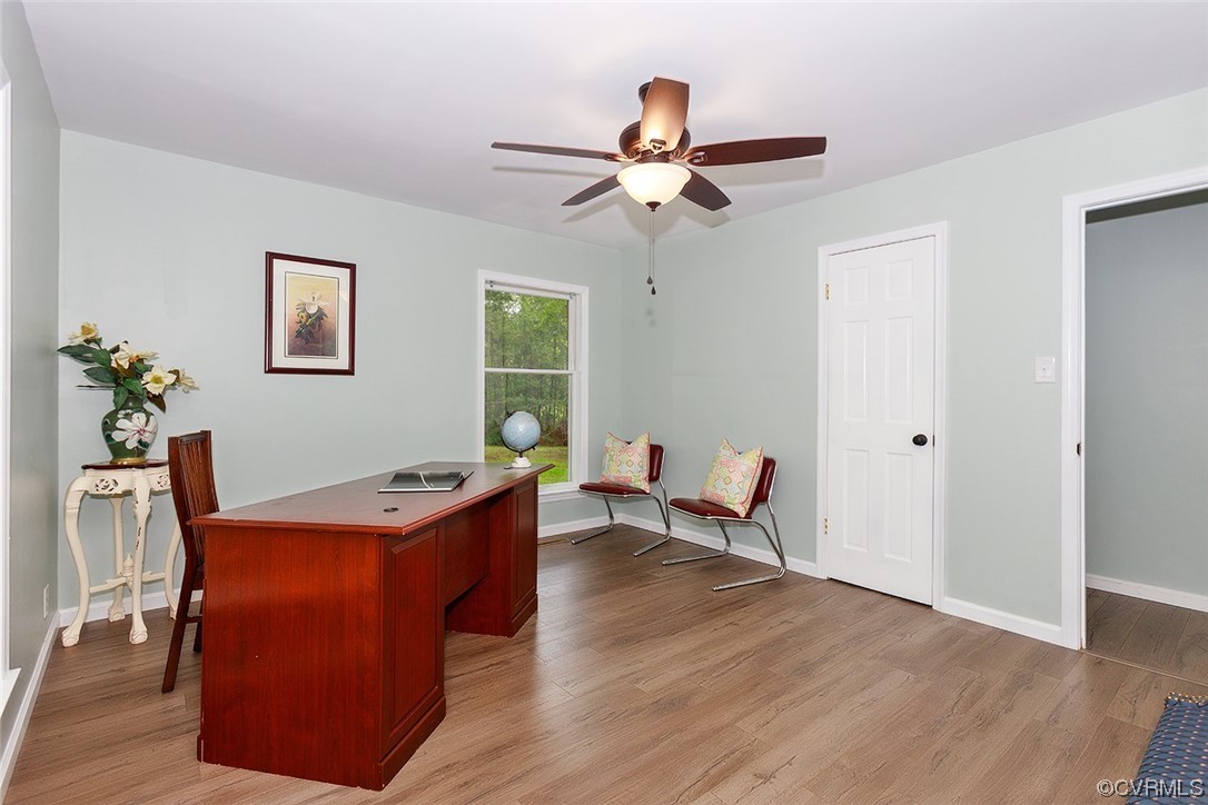 674 Spring Grove Road Spring Grove, VA 23881 - Photo 30 of 37 a view of a dining room with furniture window and wooden floor