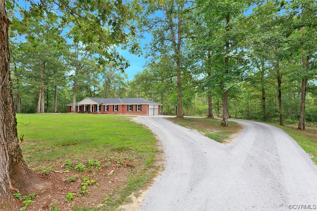 674 Spring Grove Road Spring Grove, VA 23881 - Photo 3 of 37 a view of a park with large trees