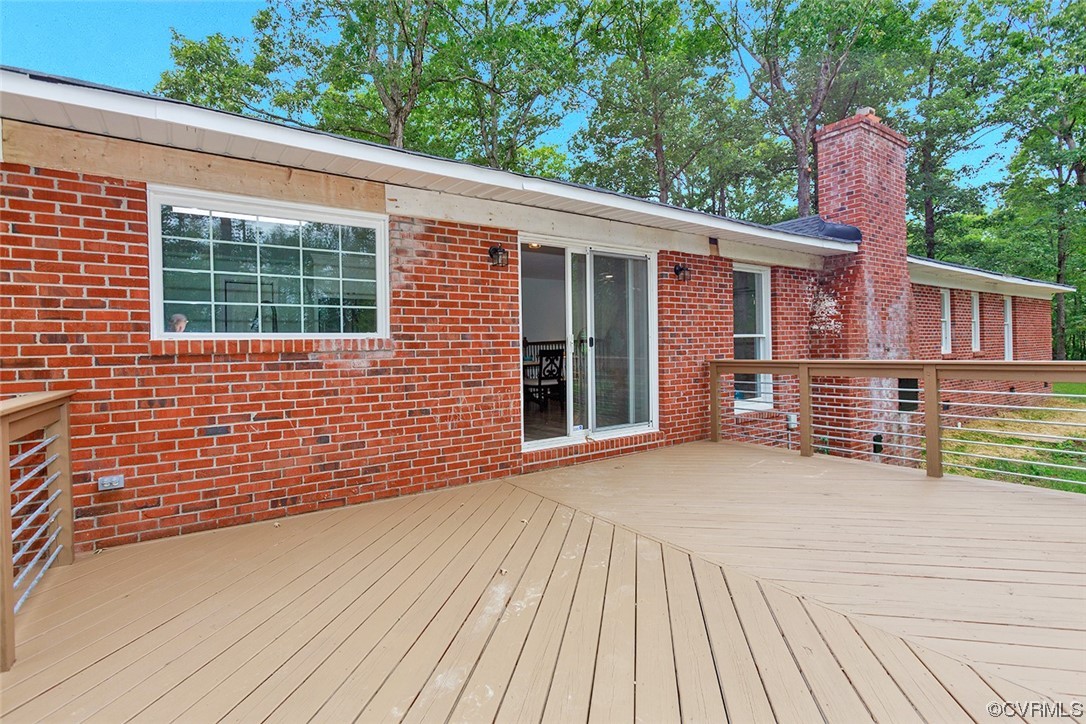 674 Spring Grove Road Spring Grove, VA 23881 - Photo 33 of 37 a view of a house with a deck