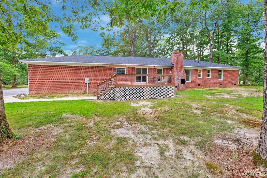 674 Spring Grove Road Spring Grove, VA 23881 - Photo 6 of 37 front view of a house with a yard