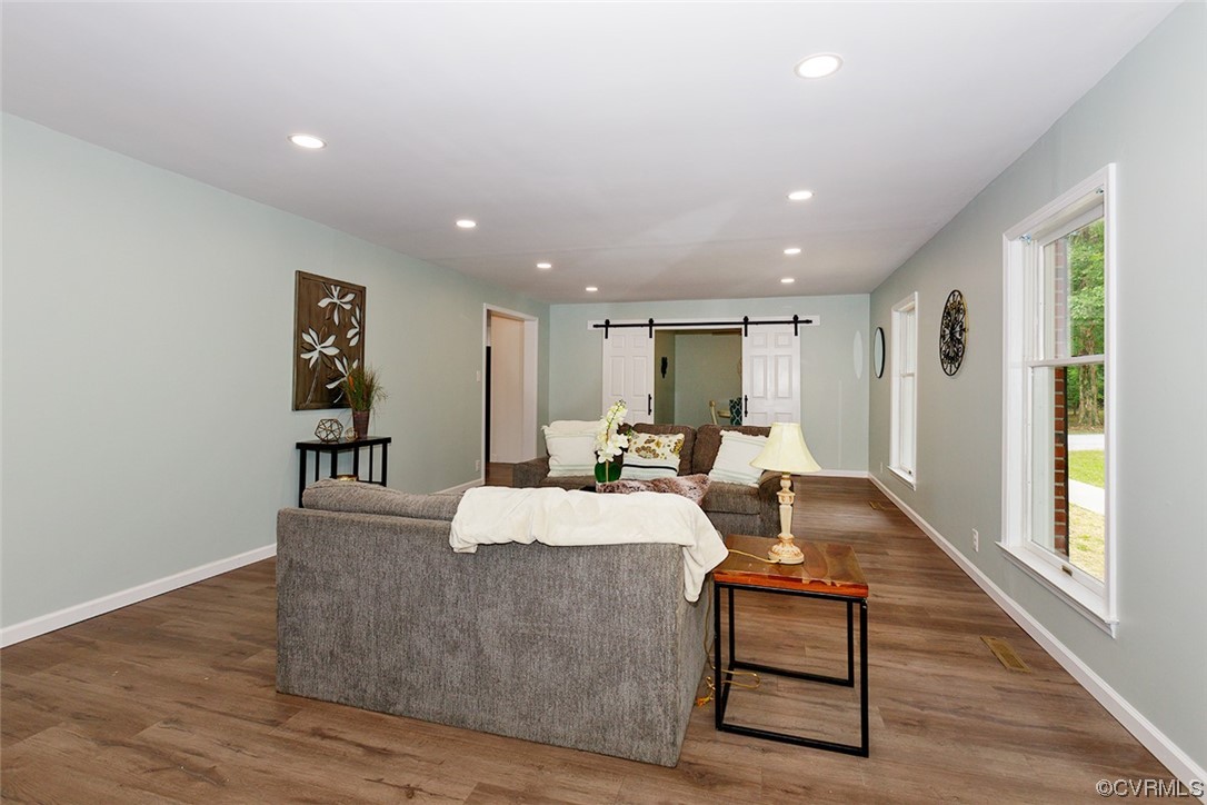 674 Spring Grove Road Spring Grove, VA 23881 - Photo 8 of 37 a living room with furniture and a wooden floor