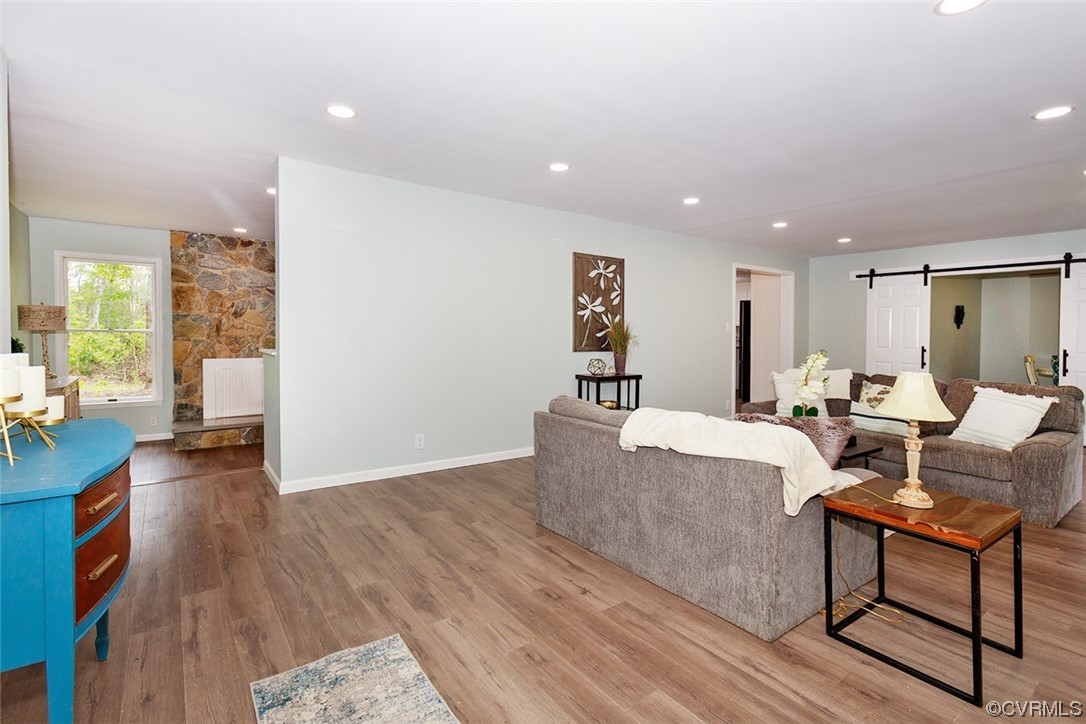 674 Spring Grove Road Spring Grove, VA 23881 - Photo 9 of 37 a living room with furniture and a wooden floor