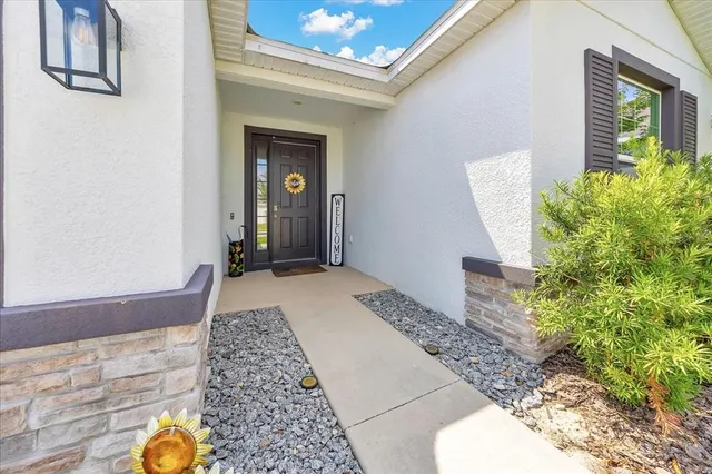 a bedroom with bed and a window