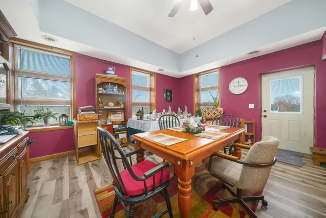 a view of a workspace with furniture