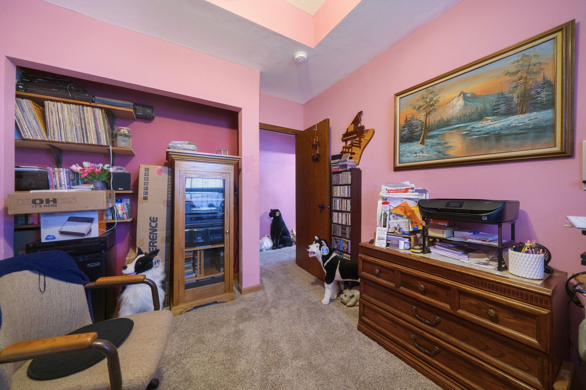 709 Franklin Street Oregon, IL 61061 - Photo 21 of 87 a living room with furniture and a flat screen tv